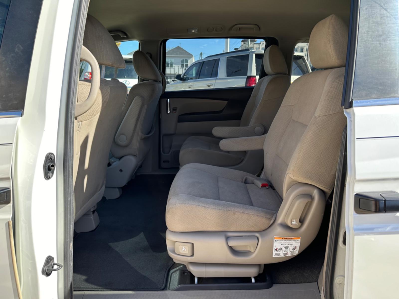 2014 White /Beige Honda Odyssey LX (5FNRL5H29EB) with an 3.5L V6 SOHC 24V engine, 6-Speed Automatic transmission, located at 1501 West 15th St., Houston, 77008, (713) 869-2925, 29.797941, -95.411789 - Photo #7